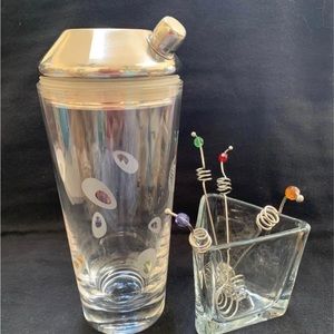Beautiful Vintage cocktail shaker with garnish sticks